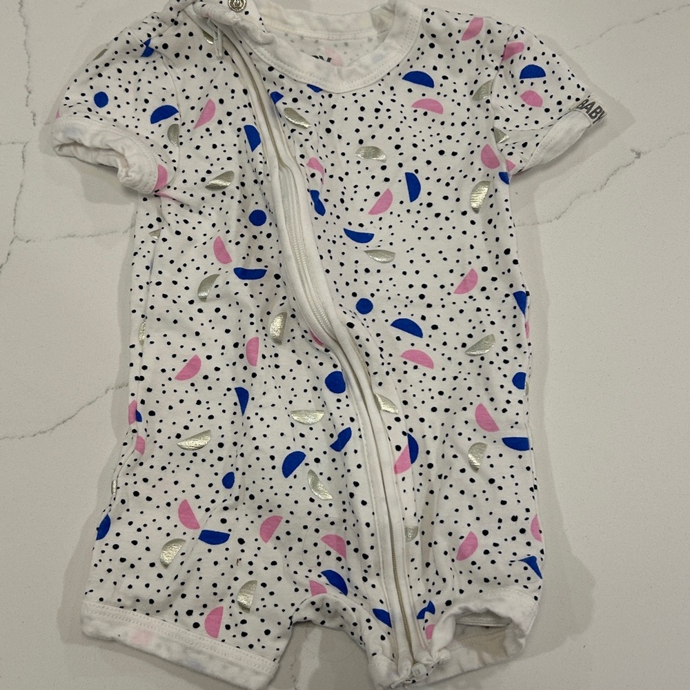 NOR White and Pink Bodysuit with Ribbed Cuffs and Diagonal Zipper